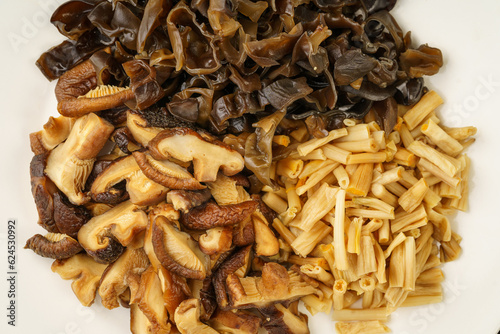 Various dried mountain delicacies on a monochrome background