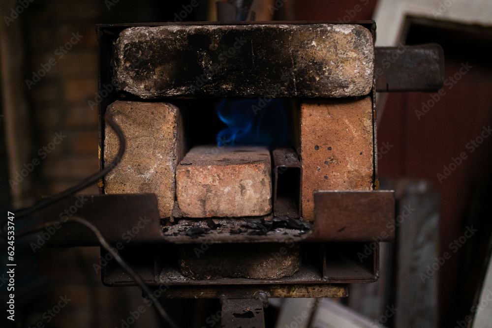 Homemade small stove in the blacksmith's workshop