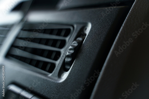 The background image of the control elements of the blower and air conditioning system of a truck.