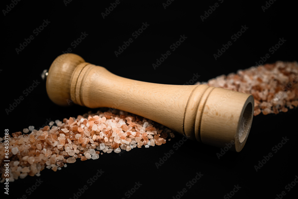 Himalayan pink salt with a grinder in wood Himalayan pink salt with a grinder in wood