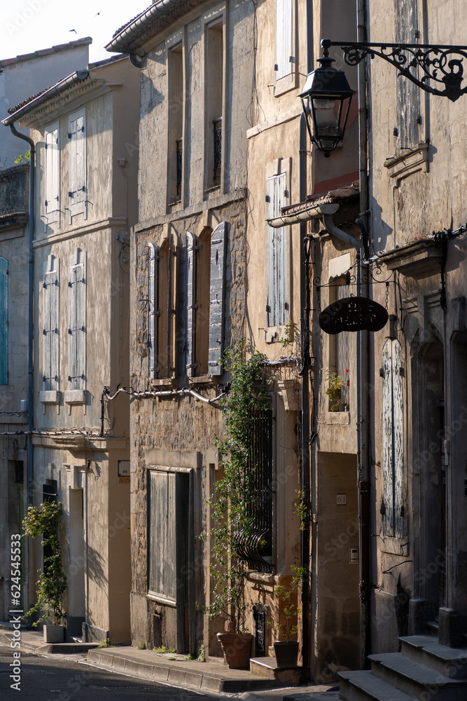 View on old streets and houses in ancient french town Arles, touristic destination Roman ruines, Bouches-du-Rhone