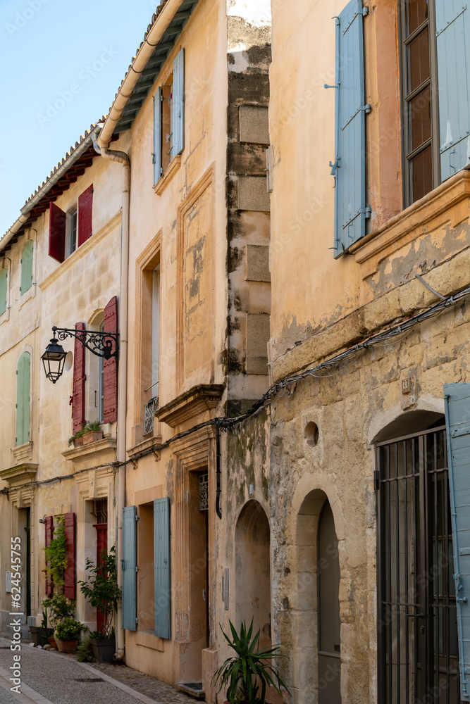 View on old streets and houses in ancient french town Arles, touristic destination Roman ruines, Bouches-du-Rhone