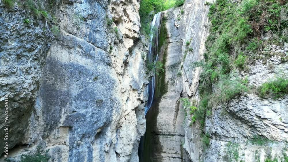 Panoramic aerial view of Chute de la Druise Waterfall. This is a large waterfall on the river Gervanne, located in Drôme, in the Auvergne-Rhône-Alpes region Panoramic aerial view of Chute de la Druise Waterfall. This is a large waterfall on the river Gervanne, located in Drôme, in the Auvergne-Rhône-Alpes region