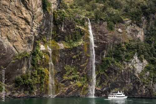 The world famous magical Milford Sound in the Fiordland national park in stormy weather