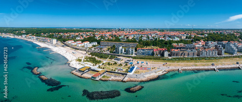 Fototapeta Naklejka Na Ścianę i Meble -  View of the Helsinborg city centre and the port of Helsingborg in Sweden. Old town by the beach and city port in Helsingborg harbour. Beautiful aerial view.