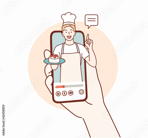 Man chef cook at smartphone screen. It's metaphor for recipe book apps. Hand drawn style vector design illustrations.