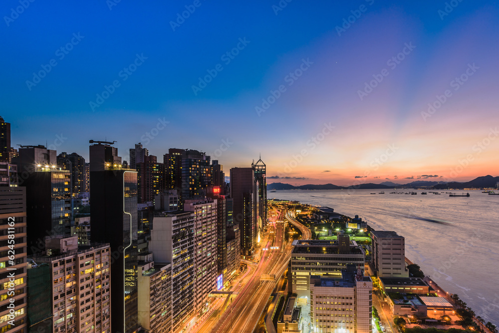 city at night during sunset