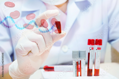 DNA testing of the blood in the laboratory with blood sample collection tubes and syringe.