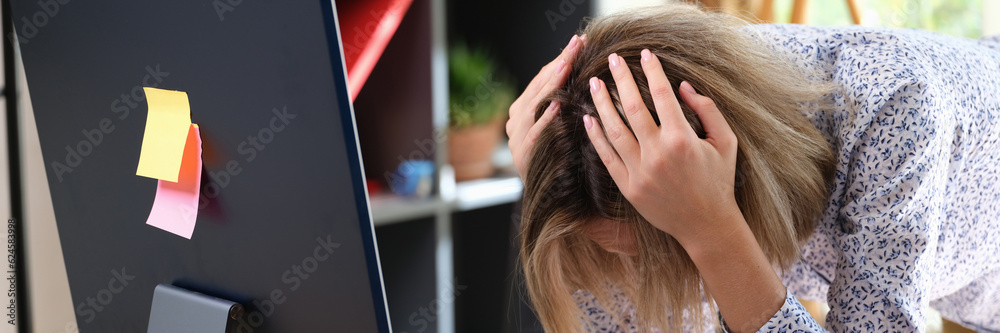 Fototapeta premium Employee suffers because of mistake and problems at work in office.