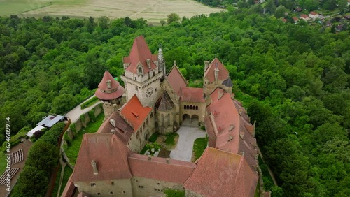 Famous Kreuzenstein Castle And Ruin In Leobendorf, Austria - aerial drone shot photo