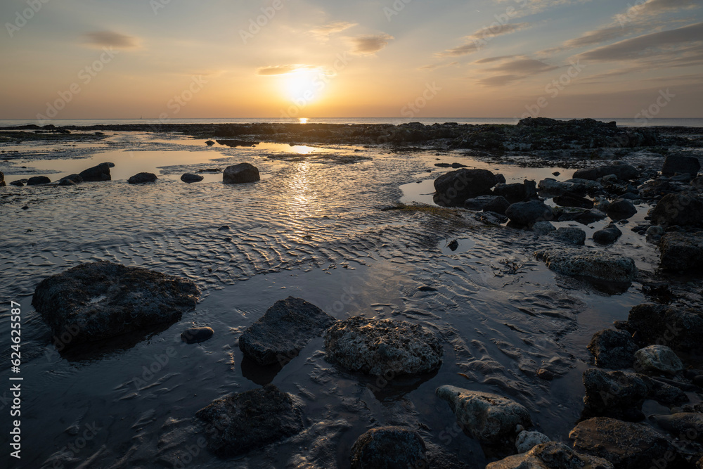 Naklejka premium sunset on the beach
