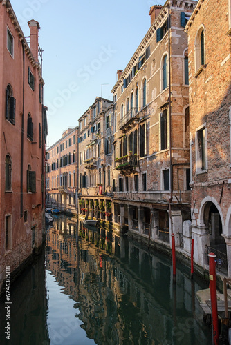 Venice, Italy - June 22, 2023: Canal, bridge and ancient houses of Venice © Leonid