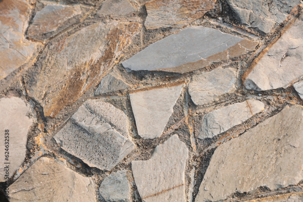 Fototapeta premium a Stone wall pattern back ground day time Jan 1 2016