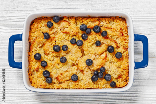 Apple Crumble topped with fresh berries, top view