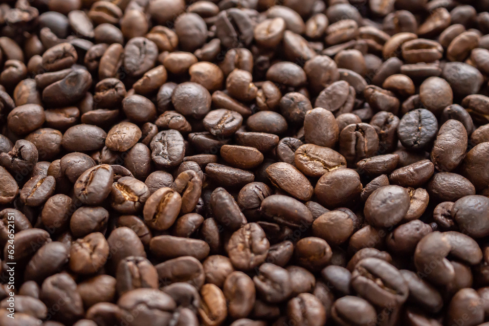 Fresh roasted brown coffee beans background Fresh roasted brown coffee beans background
