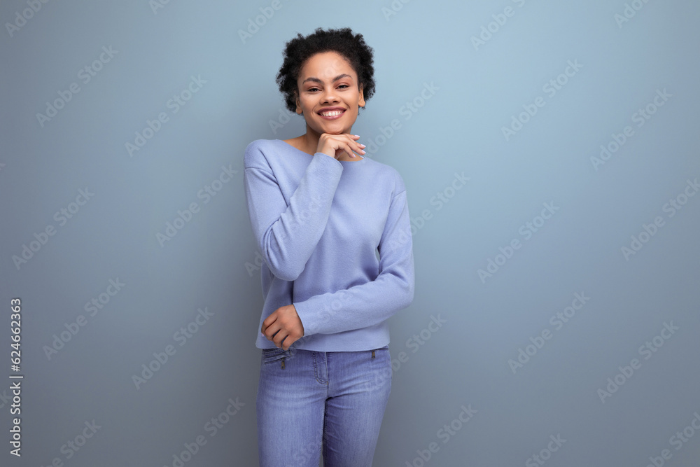 charming smiling 20s brunette woman with afro curls showing joy charming smiling 20s brunette woman with afro curls showing joy