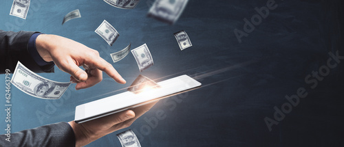 Canvastavla Winning online lottery or on bets on sports concept with man hand holding digita