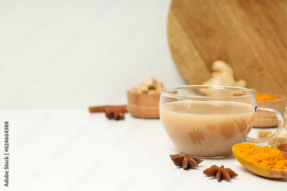 Traditional Indian hot drink with milk and spices - Masala tea Traditional Indian hot drink with milk and spices - Masala tea