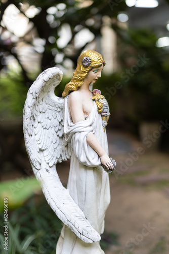 Close-up of antique angel statues.