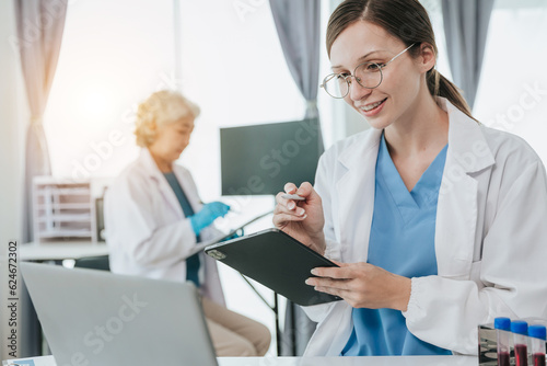female scientist in the laboratory medical pharmacy or blood DNA engineering Dropper or scientific device to test health analysis or future vaccine innovation.