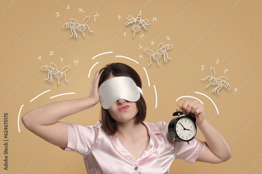 Insomnia. Woman in sleep mask with alarm clock can`t falling asleep because of buzzing mosquitos