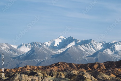 Mountain range behind semi desert area