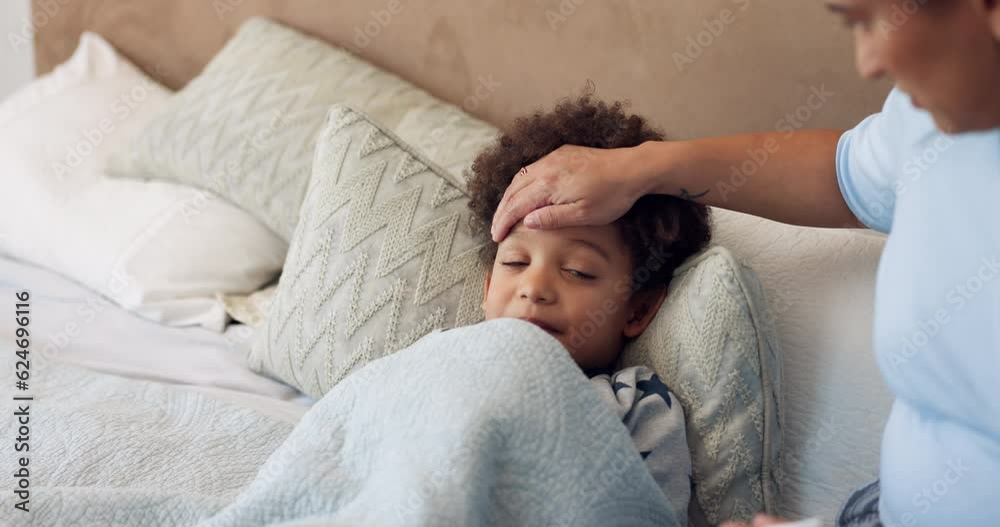 Fever, sick and mother with child in bedroom for medical, help and first aid. Virus, monitor and healthcare with worried woman and check on boy in bed in family home for support, influenza and care