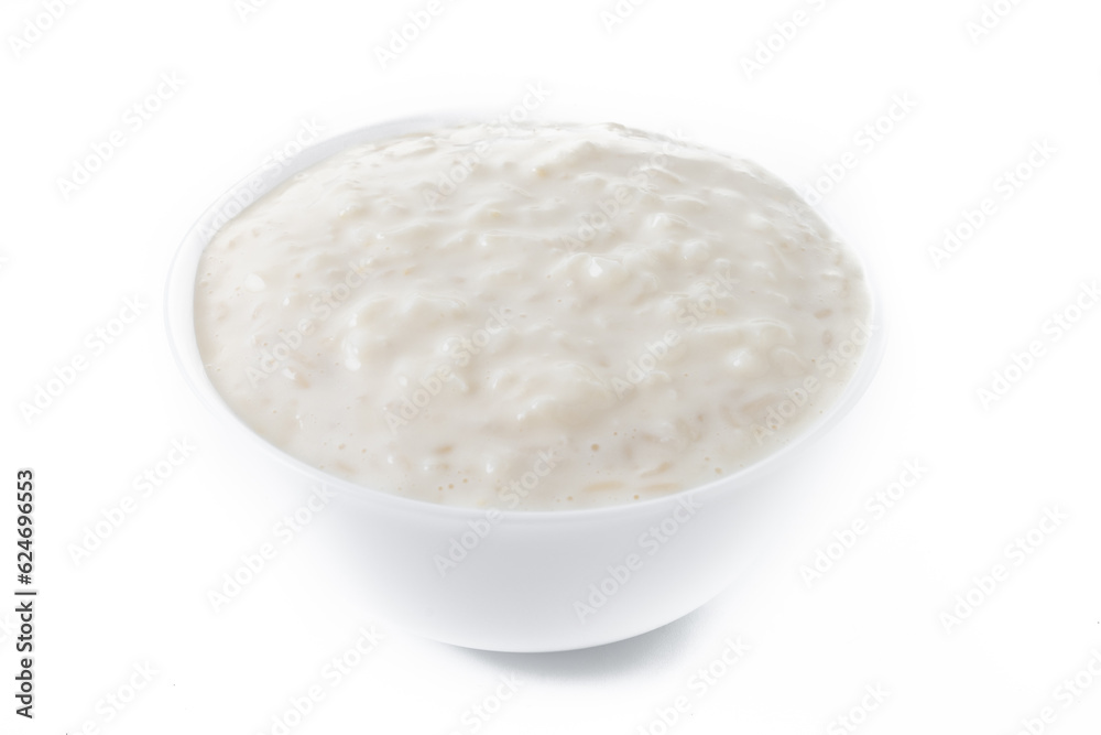 Rice pudding. Arroz con leche. Rice pudding in white bowl isolated on white background. Rice pudding. Arroz con leche. Rice pudding in white bowl isolated on white background.