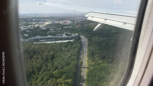 View from window of airplane landind in Nuremberg, Germany in summer photo