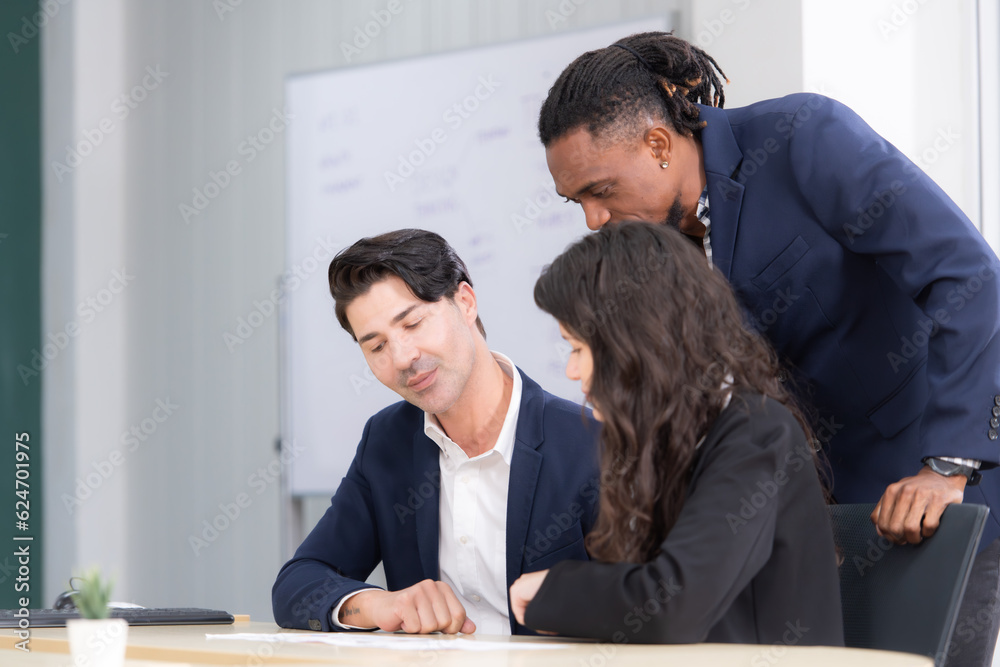 Group of business people working together in a meeting at the office. Group of business people working together in a meeting at the office.