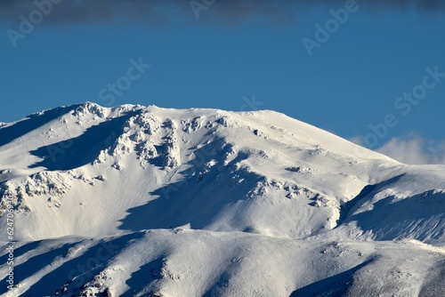 snow covered mountains © Enes