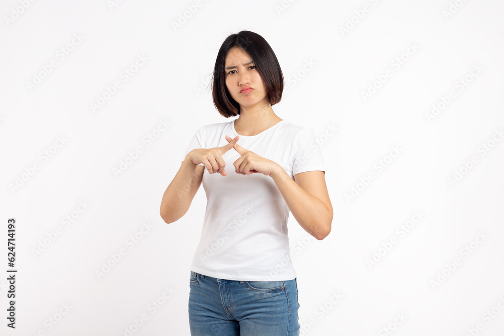 Asian woman making stop sign on white background Asian woman making stop sign on white background