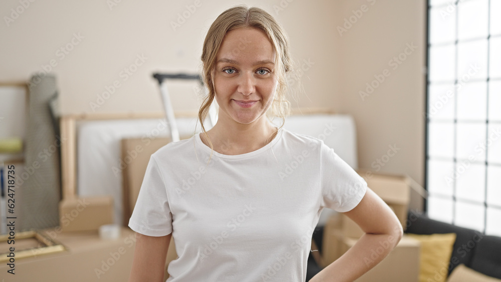 Young blonde woman smiling confident standing at new home Young blonde woman smiling confident standing at new home