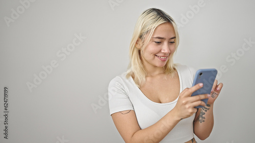 Young beautiful hispanic woman smiling confident using smartphone over isolated white background