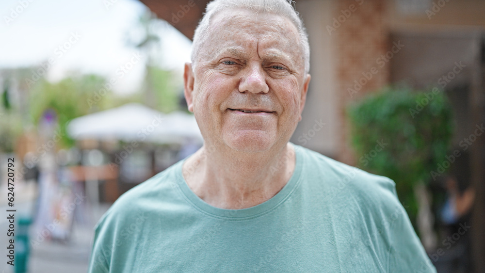 Middle age grey-haired man smiling confident standing at street Middle age grey-haired man smiling confident standing at street
