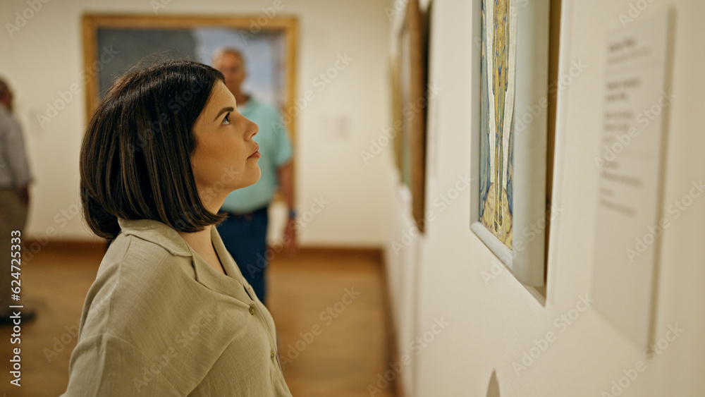 Young beautiful hispanic woman visiting art gallery at Belvedere Palace in Vienna - obrazy, fototapety, plakaty 