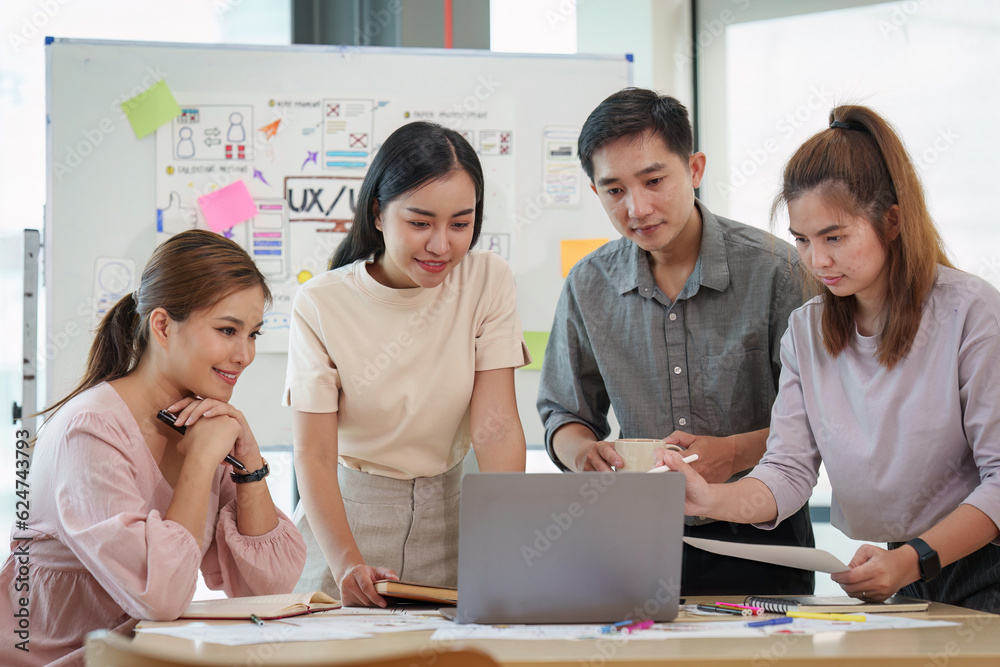 Young developer and ui designer brainstorming interface wireframe design.Creative digital development agency