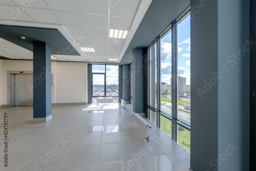 empty modern hall room with columns, doors and panoramic windows. © hiv360