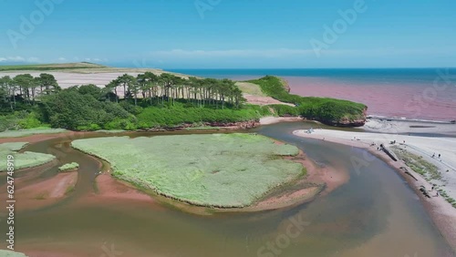 River Otter Estuary Nature Reserve from a drone, Red Sea over Budleigh Salterton Beach, Devon, England, United Kingdom, Europe photo