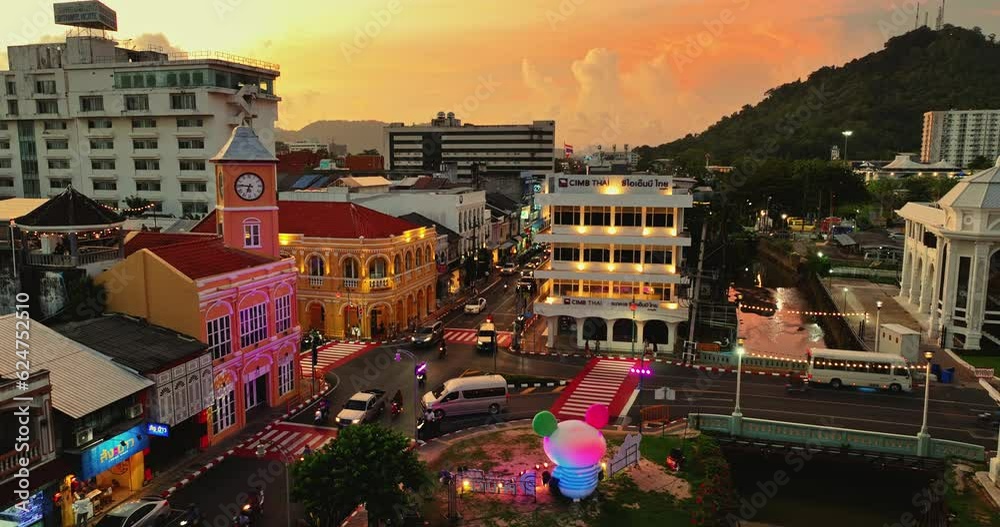Phuket,Thailand-May,20,2023: aerial view colorful sunset above beautiful old architecture in .Phuket city. Beautiful architecture in the famous old town area and a tourist check-in point.