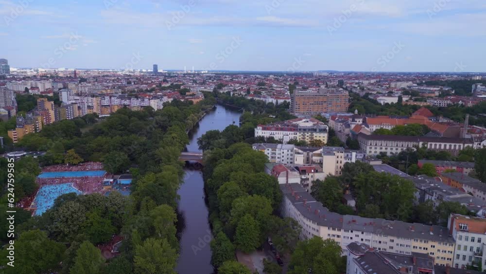 crowded public swimming pool, city Berlin. Perfect aerial top view flightdrone crowded public swimming pool, city Berlin. Perfect aerial top view flightdrone
