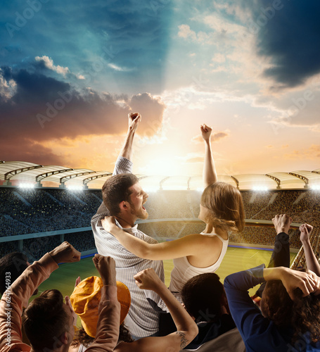 Football fans support their team, excited couple chanting name of team over evening sport arena, 3d model. Concept of sport, emotions, competition.
