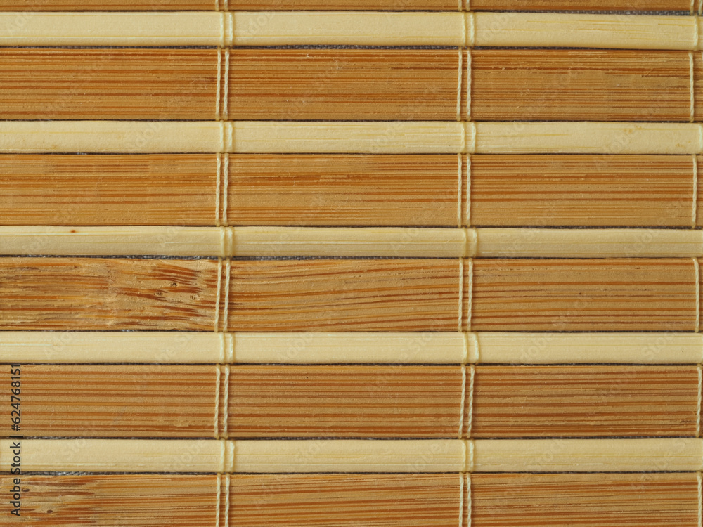 bamboo texture, material with a visible pattern, dark yellow and light planks tied with a string, bamboo mat, in the light and shadow. background, wallpaper for various graphics bamboo texture, material with a visible pattern, dark yellow and light planks tied with a string, bamboo mat, in the light and shadow. background, wallpaper for various graphics