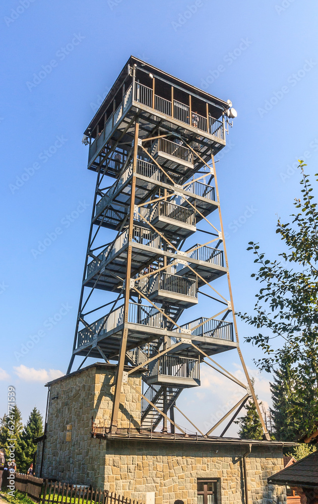 The observation tower on the top of Wielka Czantoria (Velká Čantoryje) in the Silesian Beskids on the Polish-Slovak border on a sunny summer day.