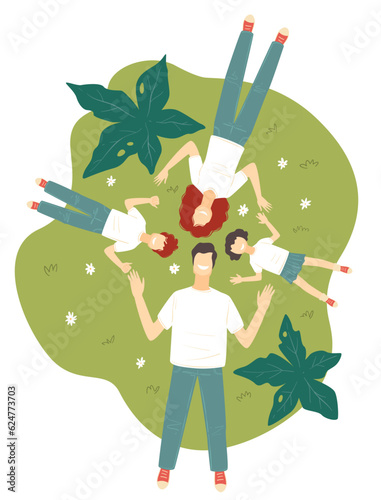 Family laying on spring glass, mother and father