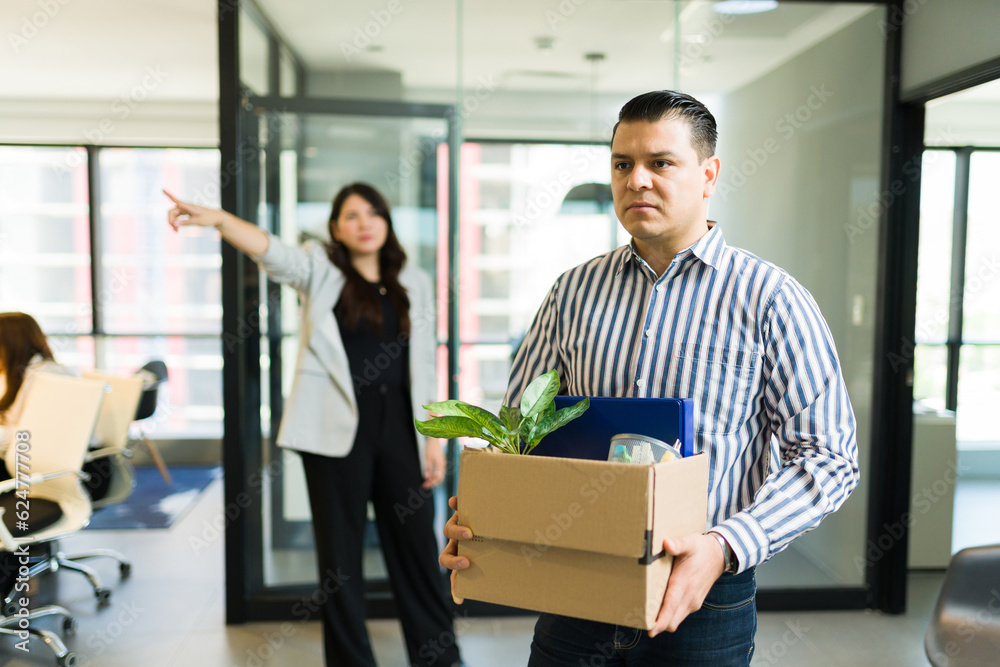 Ταπετσαρία Sad mid adult male employee being dismissed by angry boss in office