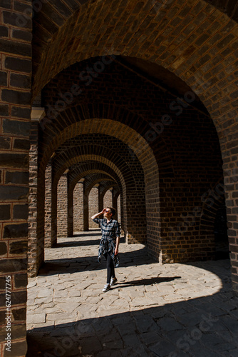 people tourists happy ruins roman architecture arches © yuriy