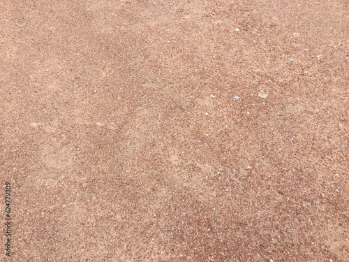 Sand texture background. Floor surface. Top view. Copy space.