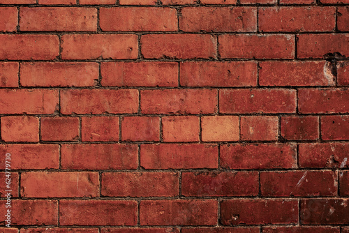 Brick wall texture. Background for design. Red color. Old and grungy wall surface.