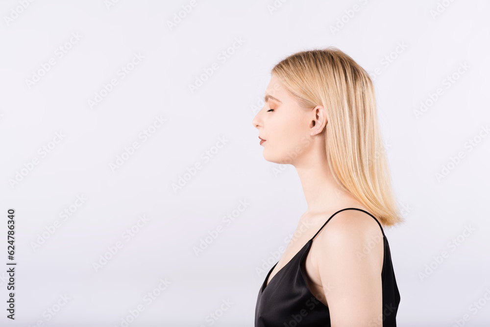 Portrait of an elegant and beautiful blonde girl on a white background Portrait of an elegant and beautiful blonde girl on a white background